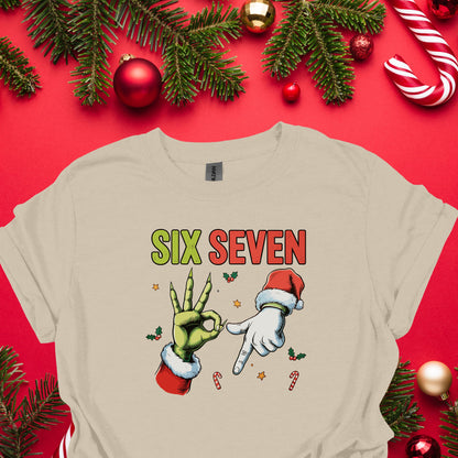 Funny Christmas “Six Seven” Hand Gesture Shirt – Holiday Humor Tee, Santa & Green Hand Xmas Gag Gift