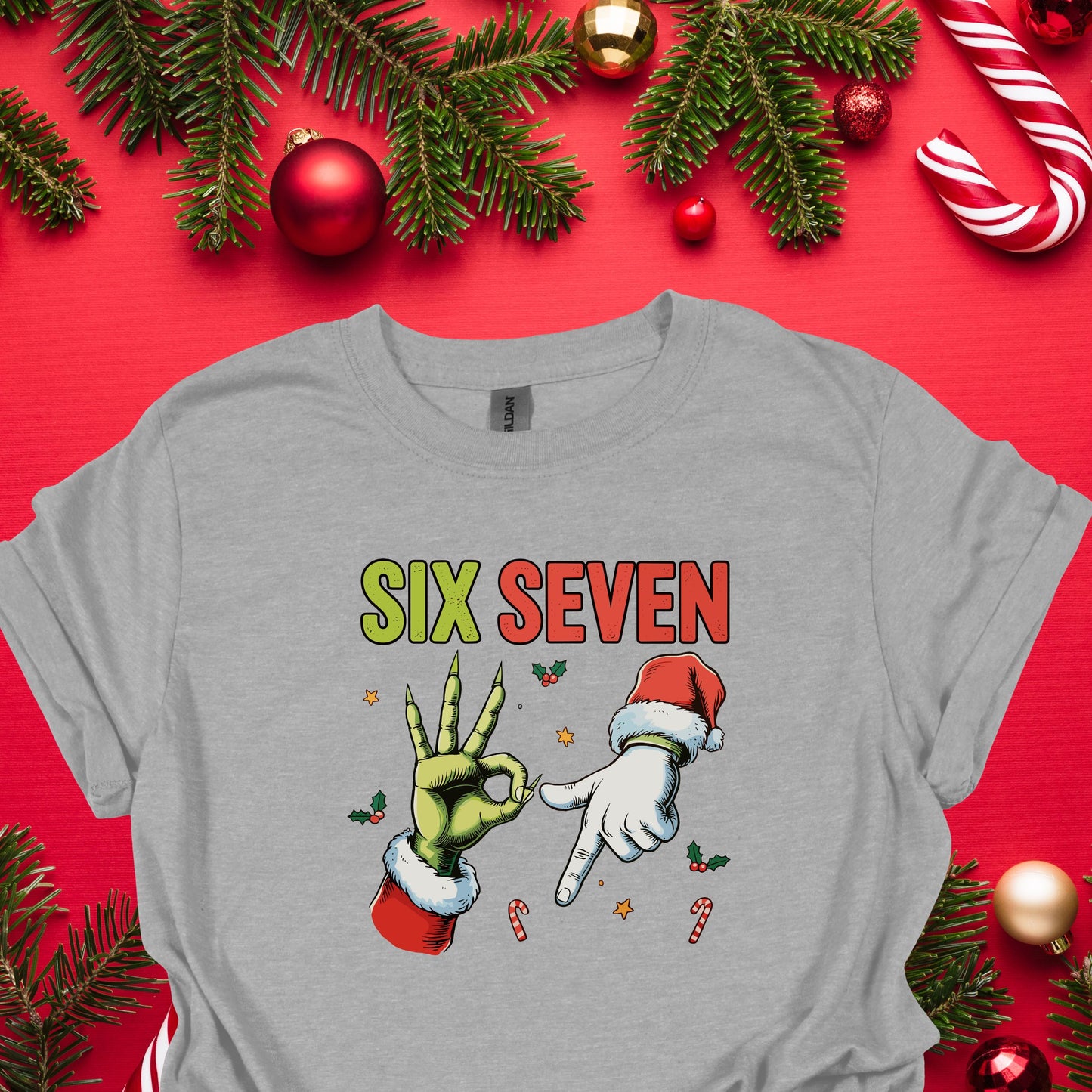 Funny Christmas “Six Seven” Hand Gesture Shirt – Holiday Humor Tee, Santa & Green Hand Xmas Gag Gift